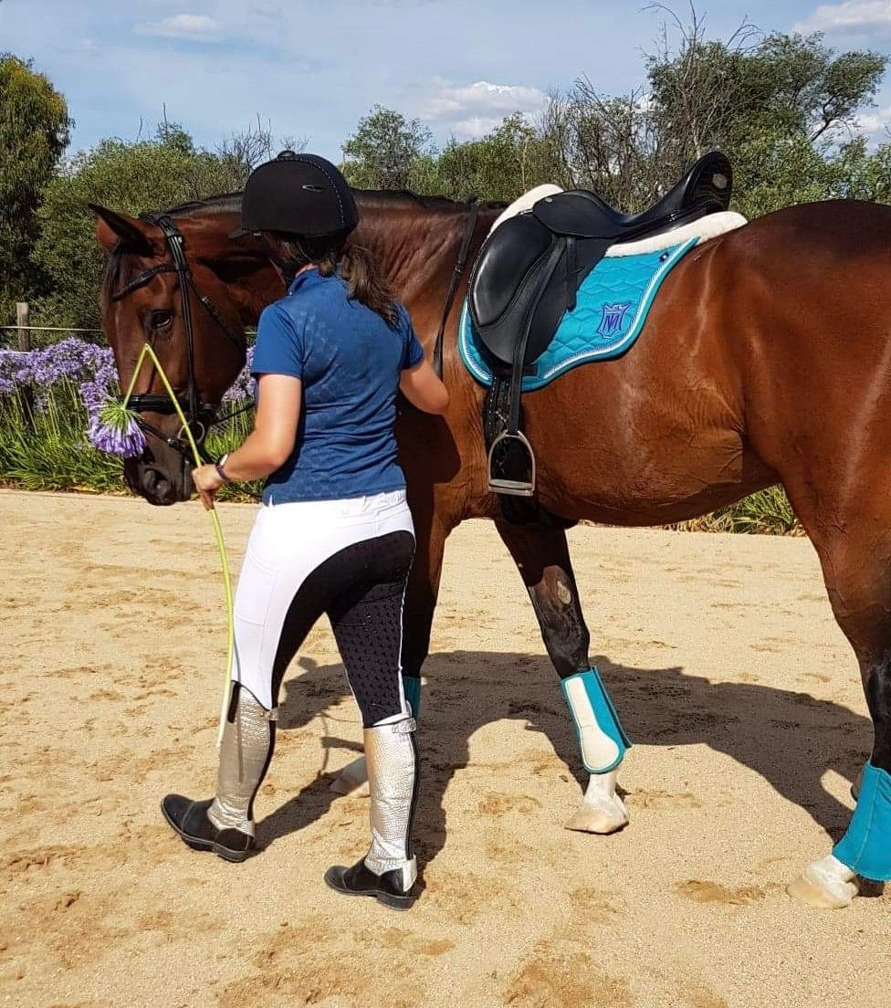 White equestrian competition tights with black silicone full seat grip